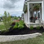 Bark Mulch Installation In Corner Garden Bed By GroundSmith