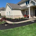 Bark Mulch Installation In Front Yard Beds By GroundSmith
