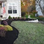 Bark Mulch Installation In Front Yard Garden Beds By GroundSmith